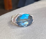 Silver Wire Wrapped Ring with Blue Oval Crystal