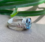 Silver Wire Wrapped Ring with Blue Oval Crystal